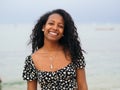 Portrait of a smiling young African American woman looking at camera. millennial woman ,positive emotions Royalty Free Stock Photo