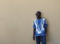 Portrait of a smiling young african man wearing traditioinal clothes