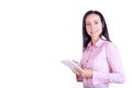 Portrait of a smiling, young attractive business woman in a pink shirt with a notepad in her hands. Business lady Royalty Free Stock Photo