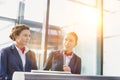 Portrait of smiling young attractive passenger service agent standing in airport