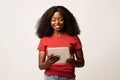 Portrait Of Smiling Young Black Female With Digital Tablet In Hands Royalty Free Stock Photo
