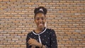 Portrait of smiling young black woman African American student studying from home and talking to her friends in webcam group Royalty Free Stock Photo