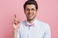 Portrait of a smiling young brunette nerd man