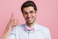 Portrait of a smiling young brunette nerd man Royalty Free Stock Photo