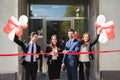 Businesspeople Cutting Red Ribbon Royalty Free Stock Photo