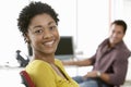 Portrait Of Smiling Young Businesswoman In Office Royalty Free Stock Photo