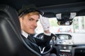 Portrait Of Smiling Young Chauffeur In Car Royalty Free Stock Photo