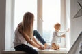 Portrait of a smiling young cute mother and her son Royalty Free Stock Photo