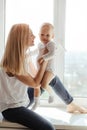 Portrait of a smiling young cute mother and her son Royalty Free Stock Photo