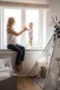 Portrait of a smiling young cute mother and her son Royalty Free Stock Photo