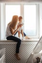 Portrait of a smiling young cute mother and her son Royalty Free Stock Photo