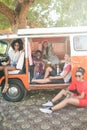 Portrait of smiling young friends at campsite