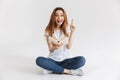 Portrait of a smiling young girl holding book Royalty Free Stock Photo