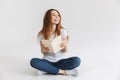 Portrait of a smiling young girl holding book Royalty Free Stock Photo