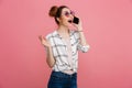 Portrait of a smiling young girl talking on mobile phone Royalty Free Stock Photo