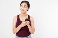 Portrait of a smiling young korean.asian woman holding mobile phone isolated on white background, chatting girl,advertising Royalty Free Stock Photo