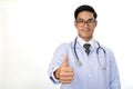 portrait of a smiling young male doctor with stethoscope show th Royalty Free Stock Photo