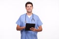 Portrait of a smiling young male nurse with digital tablet Royalty Free Stock Photo