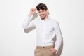 Portrait of a smiling young man dressed in shirt Royalty Free Stock Photo