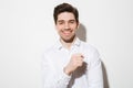 Portrait of a smiling young man dressed in shirt Royalty Free Stock Photo