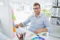 Portrait of a smiling young man using computer Royalty Free Stock Photo