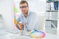 Portrait of a smiling young man using computer Royalty Free Stock Photo