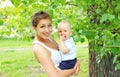 Portrait of smiling young mother and son child outdoors Royalty Free Stock Photo