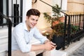 Portrait of smiling young stylish man dressed in shirt Royalty Free Stock Photo