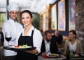 Waitress with chef in restaurant Royalty Free Stock Photo