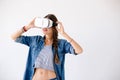 Beautiful woman using VR glasses