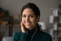 Portrait of smiling young woman listen to music in headphones Royalty Free Stock Photo