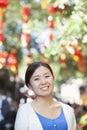 Portrait of Smiling Young Woman in Nanluoguxiang, Beijing Royalty Free Stock Photo
