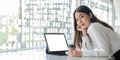 portrait of Smiling young woman showing blank laptop computer screen,blank copy space screen for your advertising text Royalty Free Stock Photo