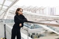 Portrait Of Smiling Young Woman Standing At Airport Terrace Royalty Free Stock Photo