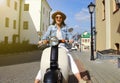 Portrait smilling beautiful girl sitting on retro scooter. Royalty Free Stock Photo