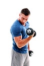 Portrait of a sportsman lifting dumbbells