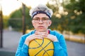 Portrait of sportsman young boy with ball