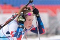 Portrait sportswoman biathlete Petrova Victoria Saint Petersburg at finish after skiing, rifle shooting Open regional