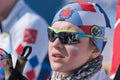 Portrait sportswoman biathlete Starovoitova Anna Saint Petersburg at finish after rifle shooting and skiing. Regional