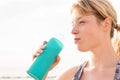 Portrait of a sportswoman with a bottle of water