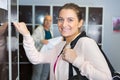 Portrait sportswoman at locker