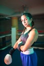 Portrait of sporty boxer girl posing for camera Royalty Free Stock Photo