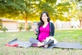 Portrait of a sporty pregnant woman drinking water Royalty Free Stock Photo