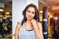 Portrait of sporty pretty smiling girl in the gym Royalty Free Stock Photo