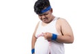 Portrait of sporty young man measure his chest size Royalty Free Stock Photo