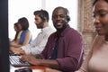 Portrait Of Staff In Busy Customer Service Department Shot Royalty Free Stock Photo