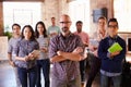 Portrait Of Staff Standing In Modern Design Office Royalty Free Stock Photo