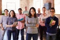 Portrait Of Staff Standing In Modern Design Office Royalty Free Stock Photo