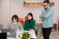 Portrait of startup business team discussing project ideas at workplace table, talking, speaking, asking questions Royalty Free Stock Photo