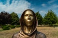 Portrait of the statue of Satoshi Nakamoto mysterious founder of Bitcoin